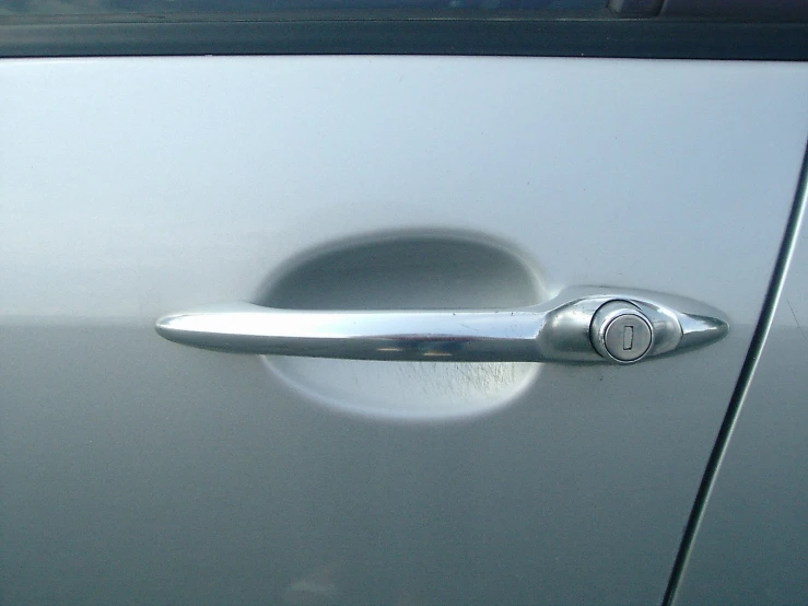 an image of a close up of the door handle