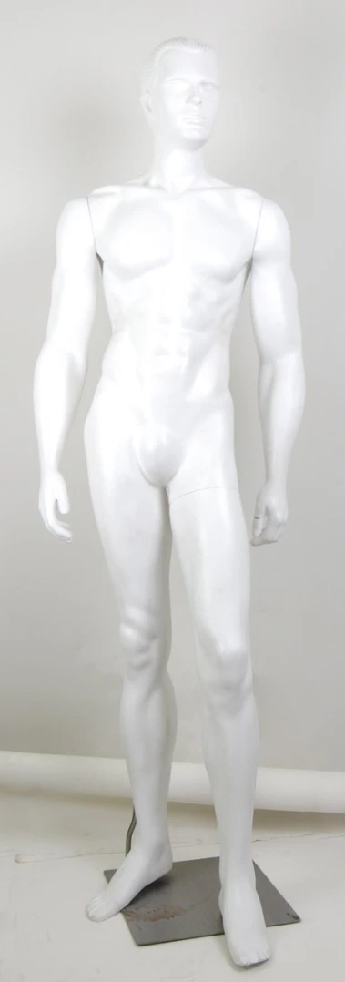 white dummy sculpture standing in front of a white background
