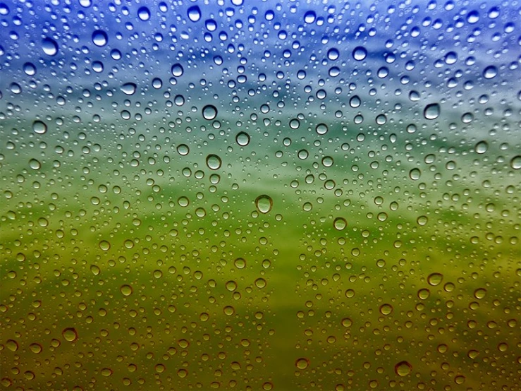 a picture of some water drops on the glass