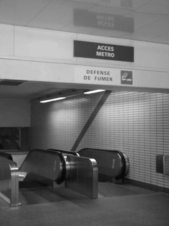 a long row of metal steps in an empty airport