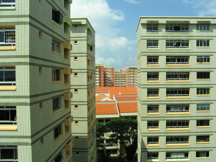 some buildings are looking down on the street