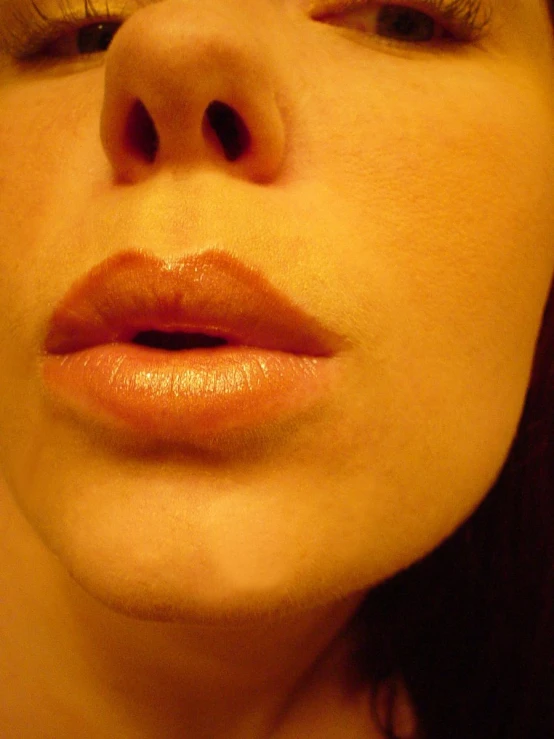 a close up po of a person's lips showing the upper lip