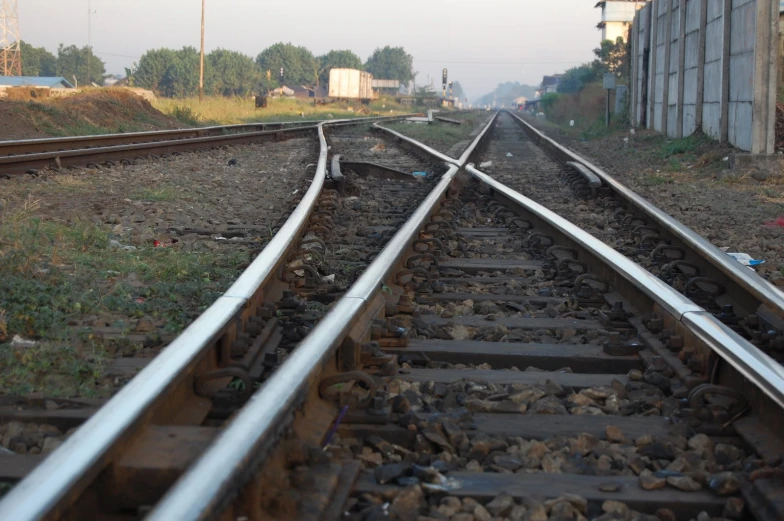 some empty railroad tracks in the countryside