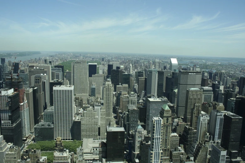 an aerial view of a big city with many tall buildings