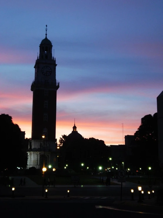 this is a clock tower in a city square