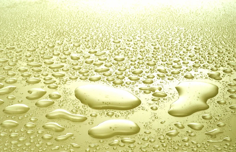water droplets are on the surface of a table