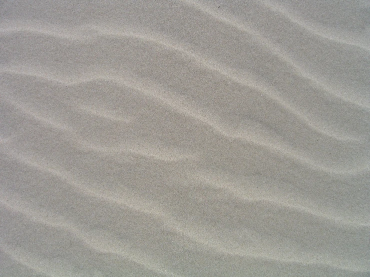 sand is very gentle on the beach with water