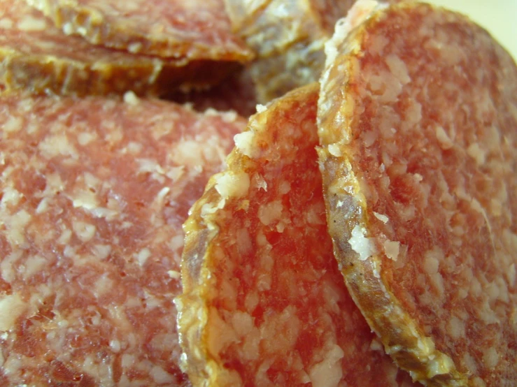 closeup po of uncut meat and grains