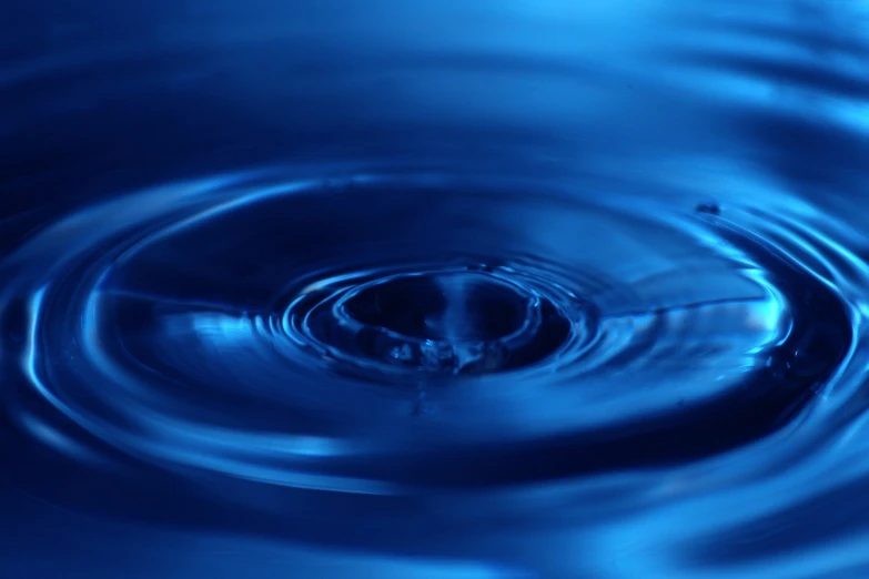 blue circles with an upside down design are shown in the water