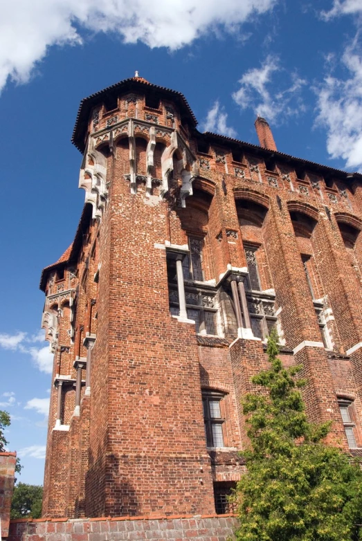 a tall tower made of brick with lots of windows