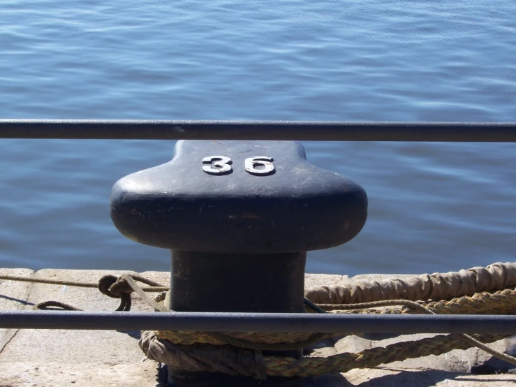 a small boat is docked in the water