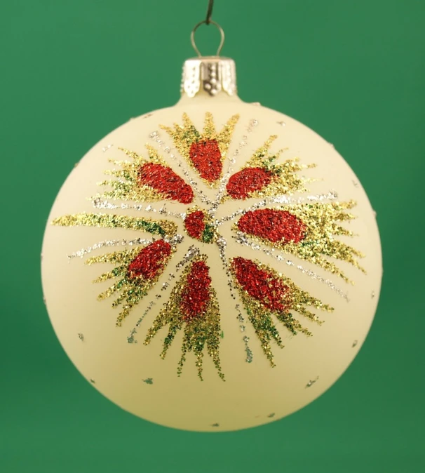 a christmas ornament with some colored glitters