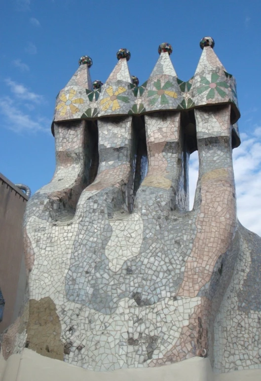 a building made from stone with mosaic designs