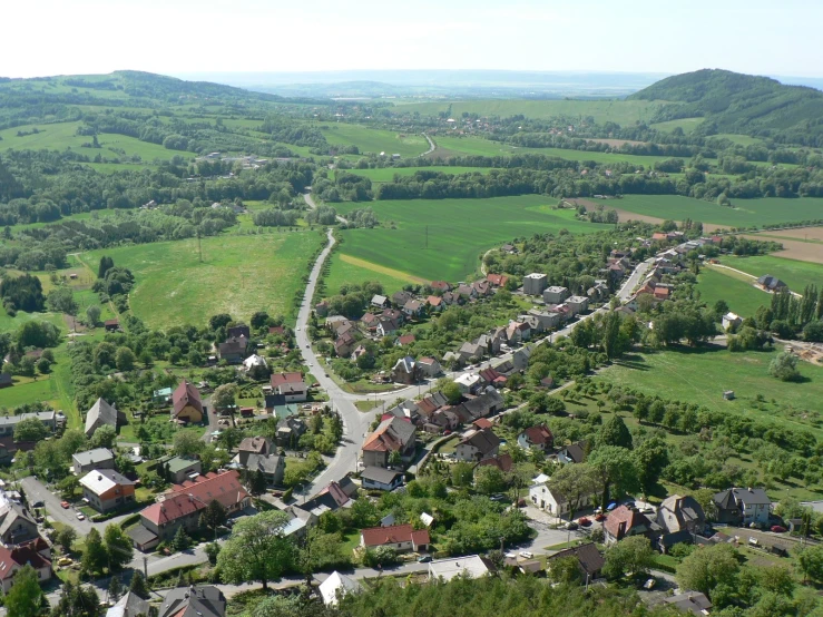 a large town surrounded by lush green countryside
