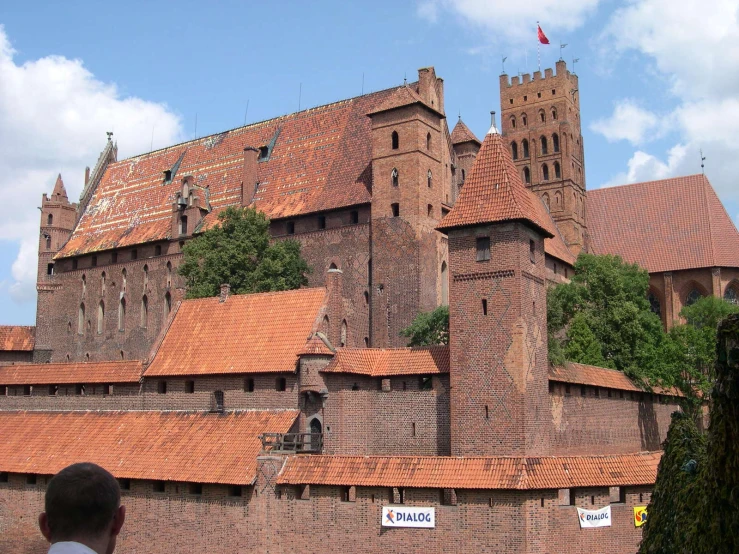 a building with a very large brick tower