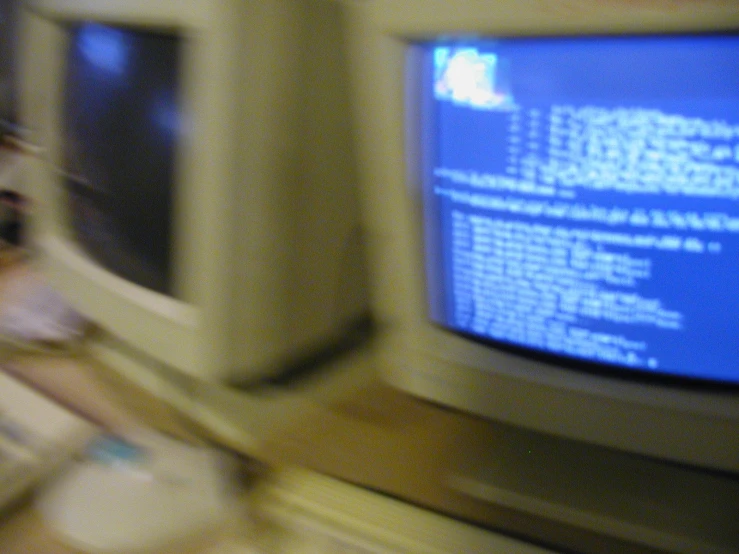 a person watching television with an old screen in front