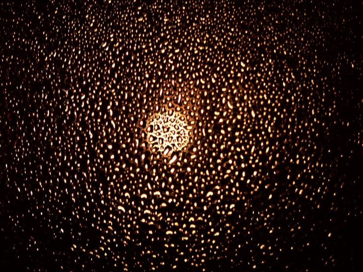 a view through an open window at a dark night