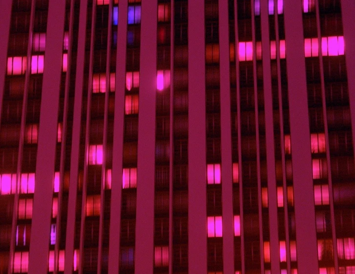 an abstract view of an office building with purple lights