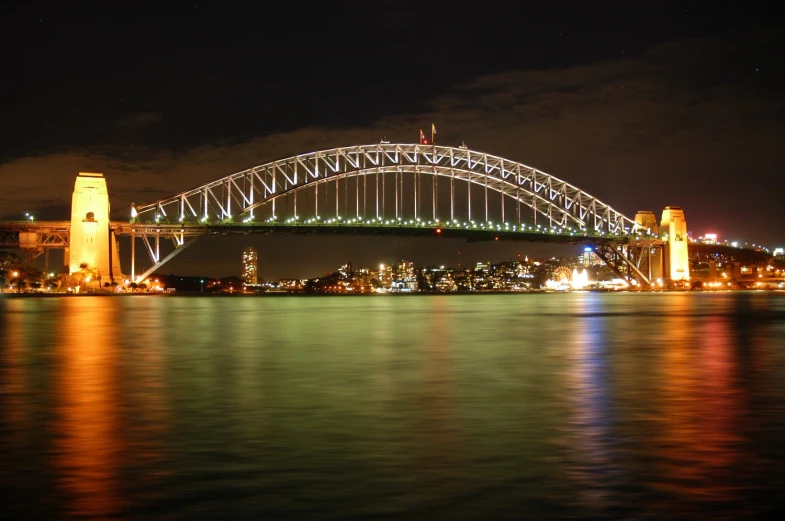 the bridge is spanning over the city and harbor