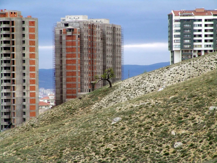 a picture of buildings on the side of a hill