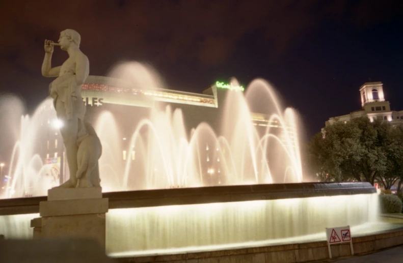 a very pretty fountain that has some lights on it