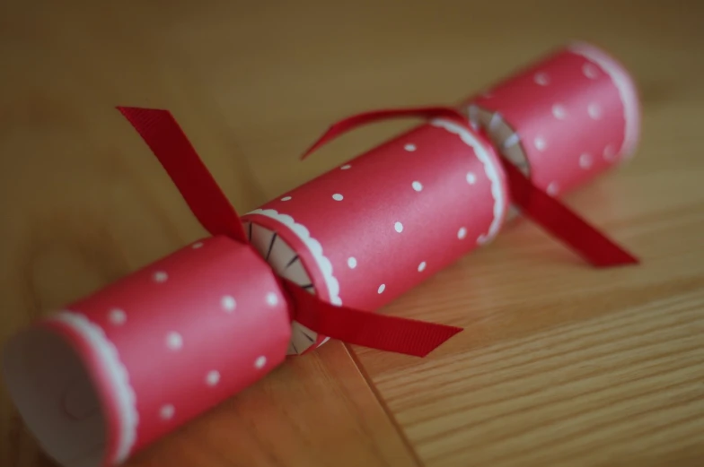 the toilet paper rolls are decorated with polka dot prints