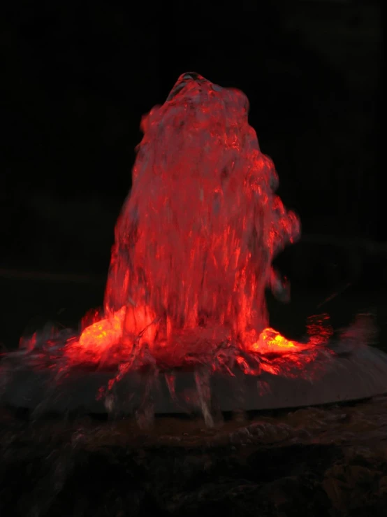 a close up of a water spewing device