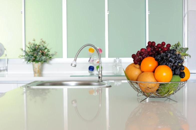 a fruit basket is sitting on a counter