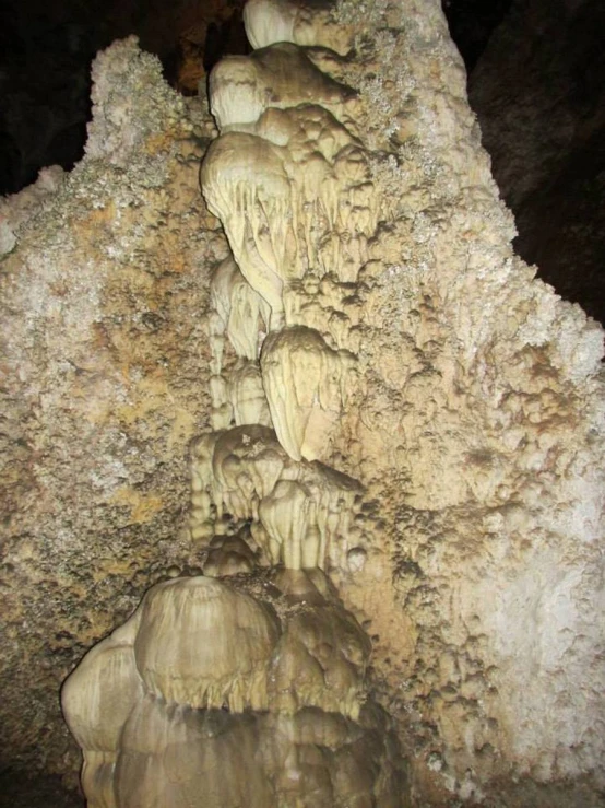 several formation of rock formations with water reflecting off them