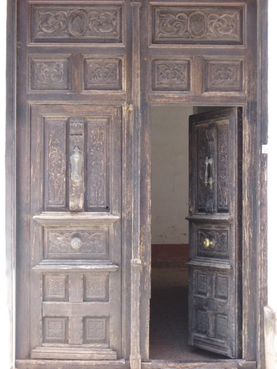 two large doors opened with the inside wooden