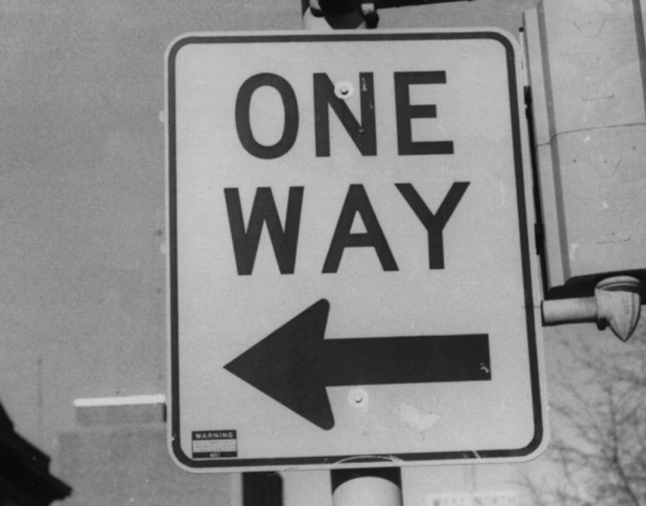 black and white image of one way sign
