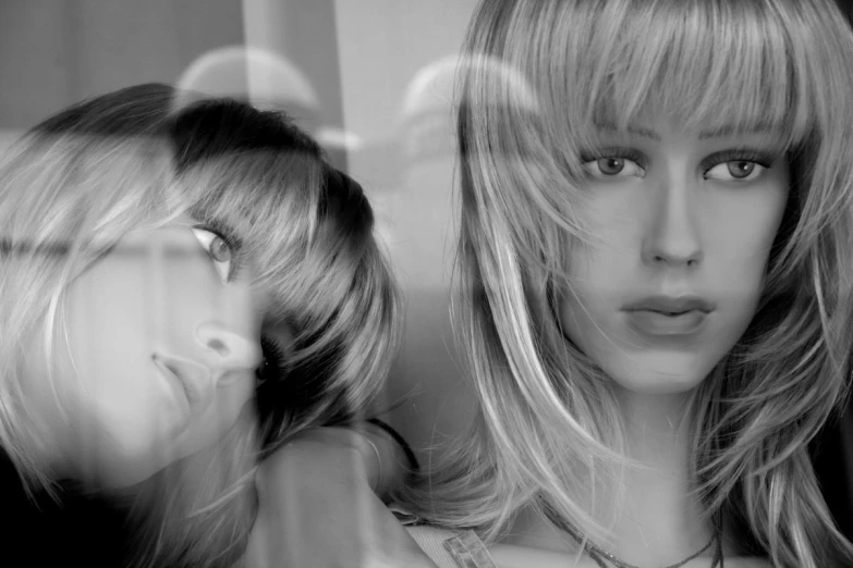 a black and white po of two girls in haircuts