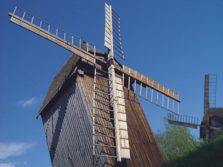 an old brick mill with wooden steps