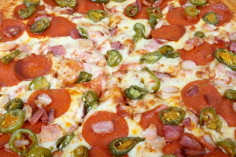 closeup of the pepperoni and jalapenos pizza with cheese