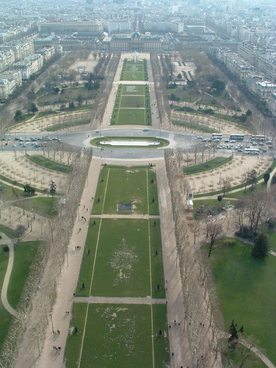 an aerial view of a park with large buildings