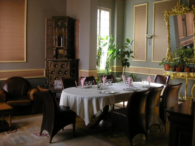 there is an old fashioned dining room with a table and chairs