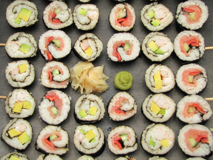 different types of sushi on a tray