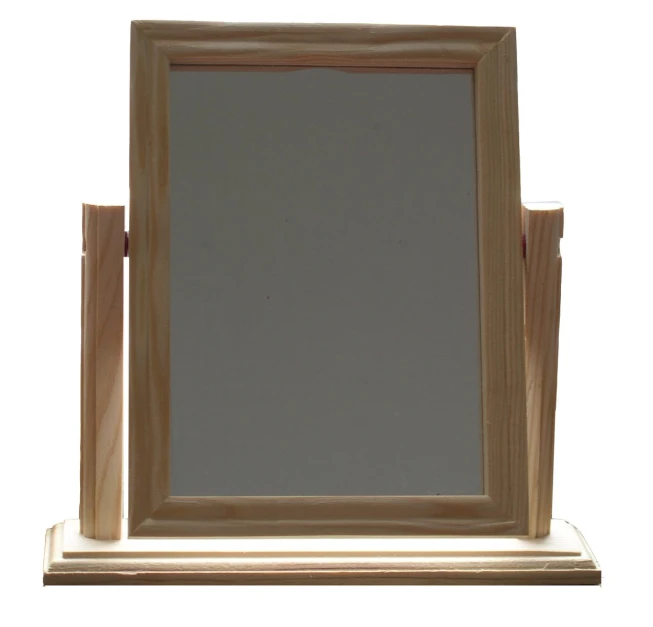 a mirror is shown on a table with a stand