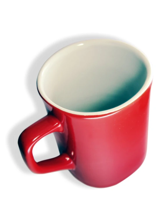 an empty red coffee mug on a white background