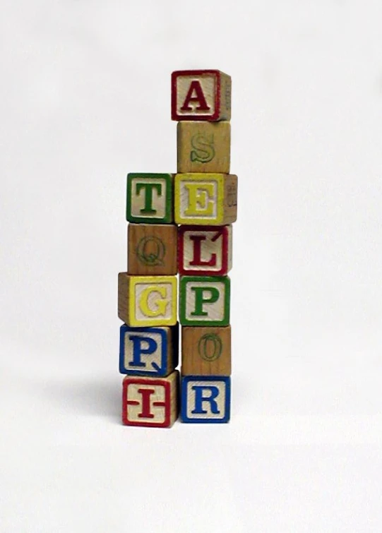 wooden blocks spelling the words help, help, and support
