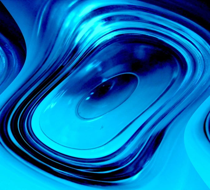 a blue swirl is being generated with the liquid inside it