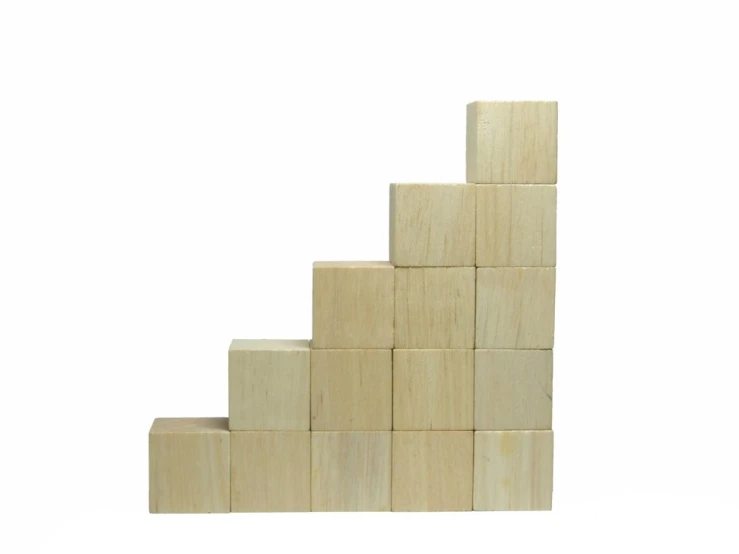 a tall wooden structure with a stair shape made of wooden blocks