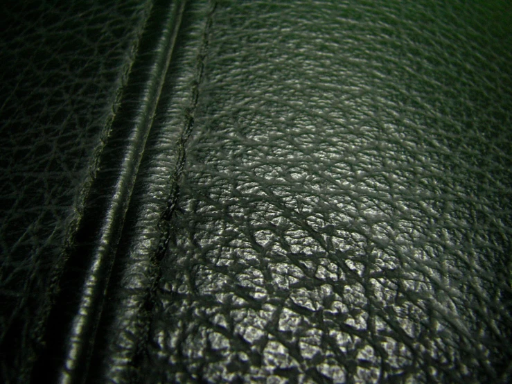 a black leather texture showing all over the surface
