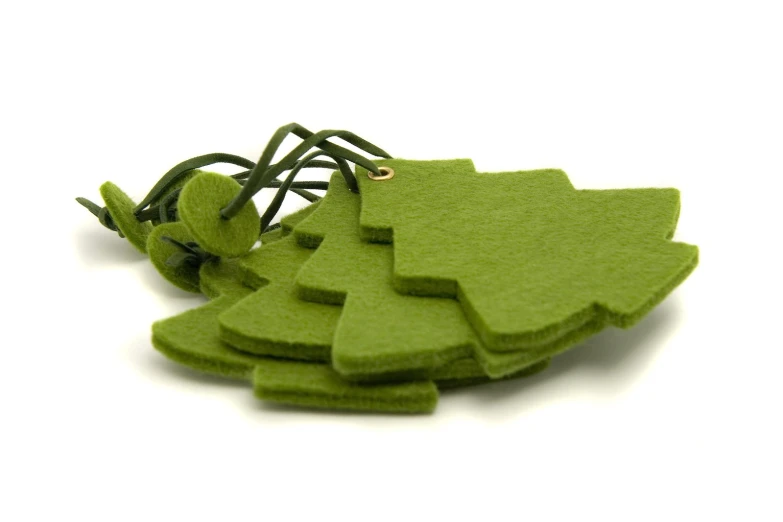 pieces of green felt sitting on top of each other