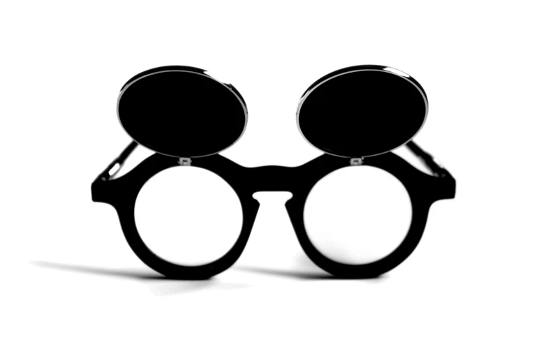 a pair of glasses sitting next to each other