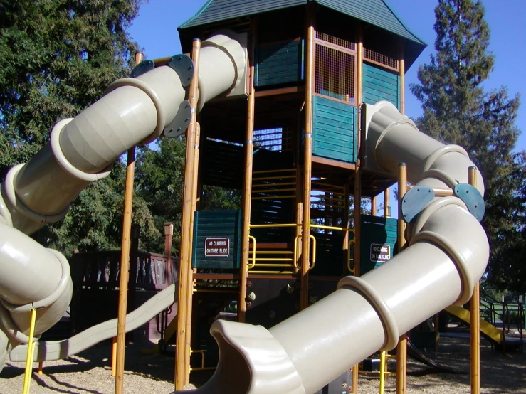 childrens play area with a slide and playground
