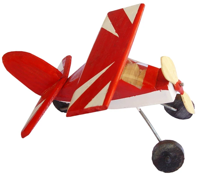 a red toy plane that is sitting up