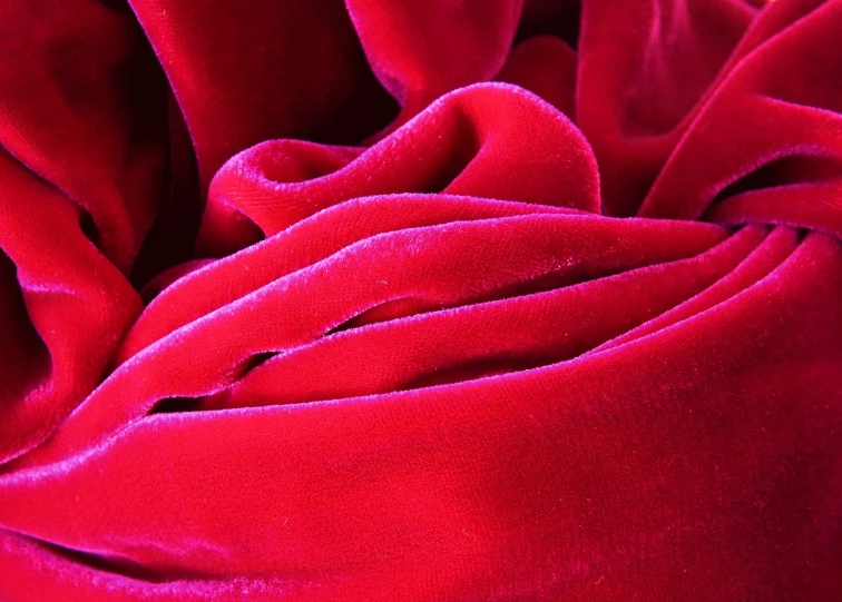 close up view of red fabric with folds