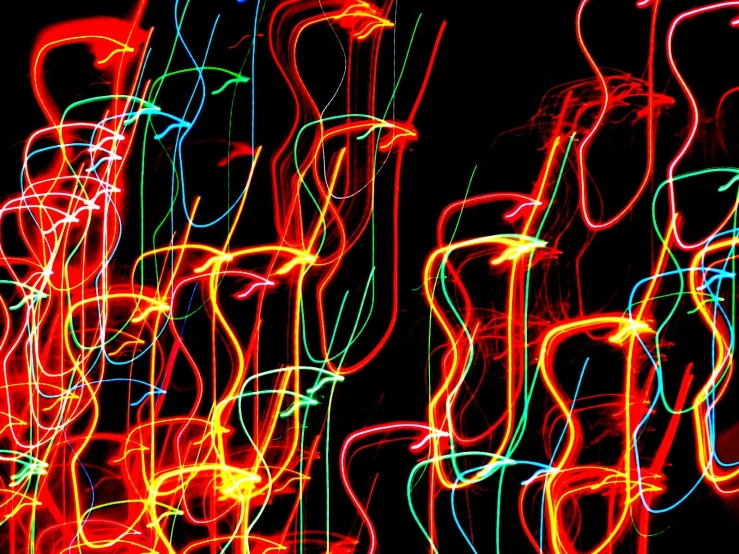 colorful motion blurs of long exposure from a light bulb
