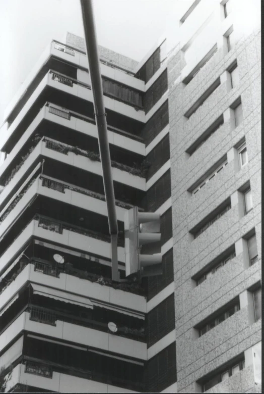 a traffic light near some tall buildings